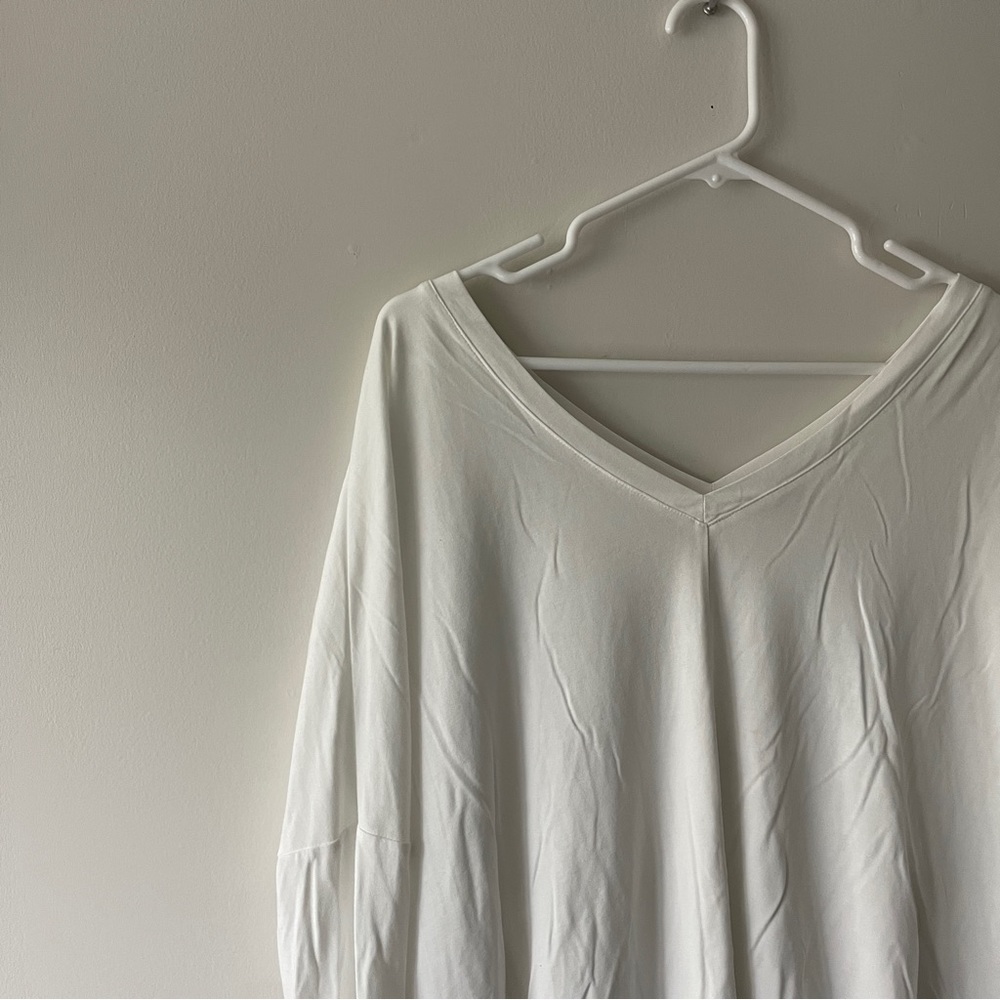 White top with peplum back